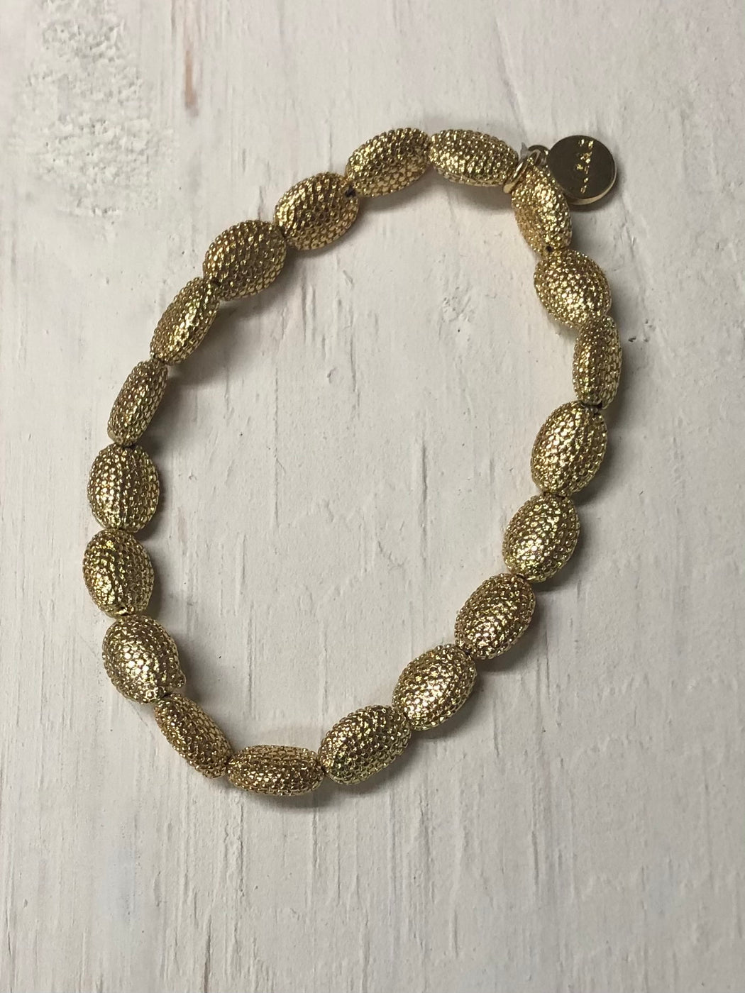 Lizas Gold Textured Oval Bead Bracelet